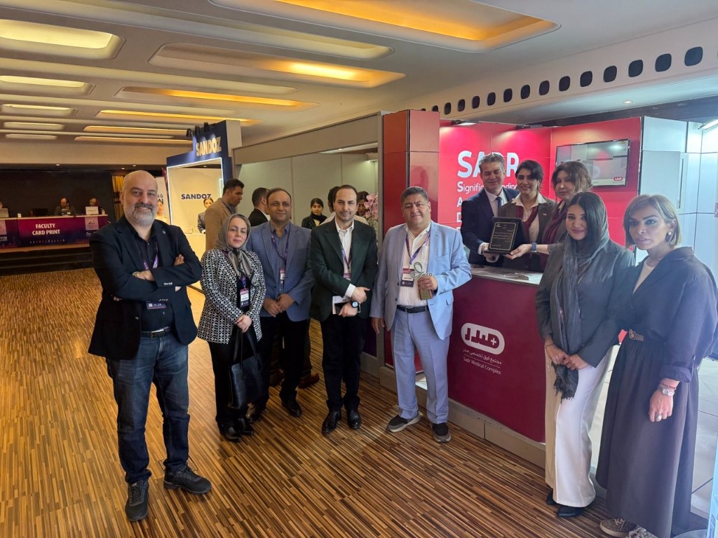 Professionals at the Sadr Medical Complex booth at the oncology congress