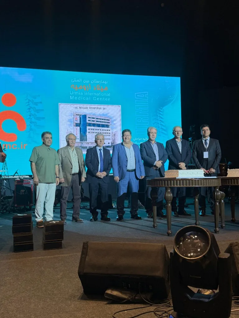 Stage group at the congress awards ceremony with Urmia International Medical Center branding