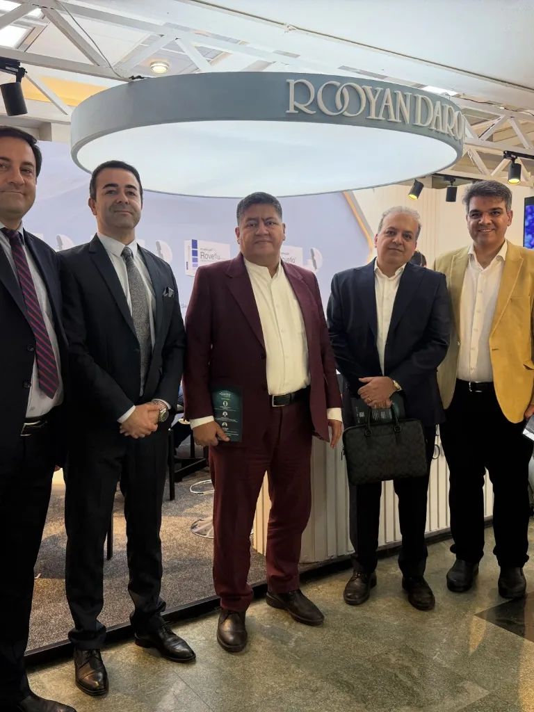 Prof. Guive Sharifi with colleagues at an exhibition stand during the Tehran pulmonary congress
